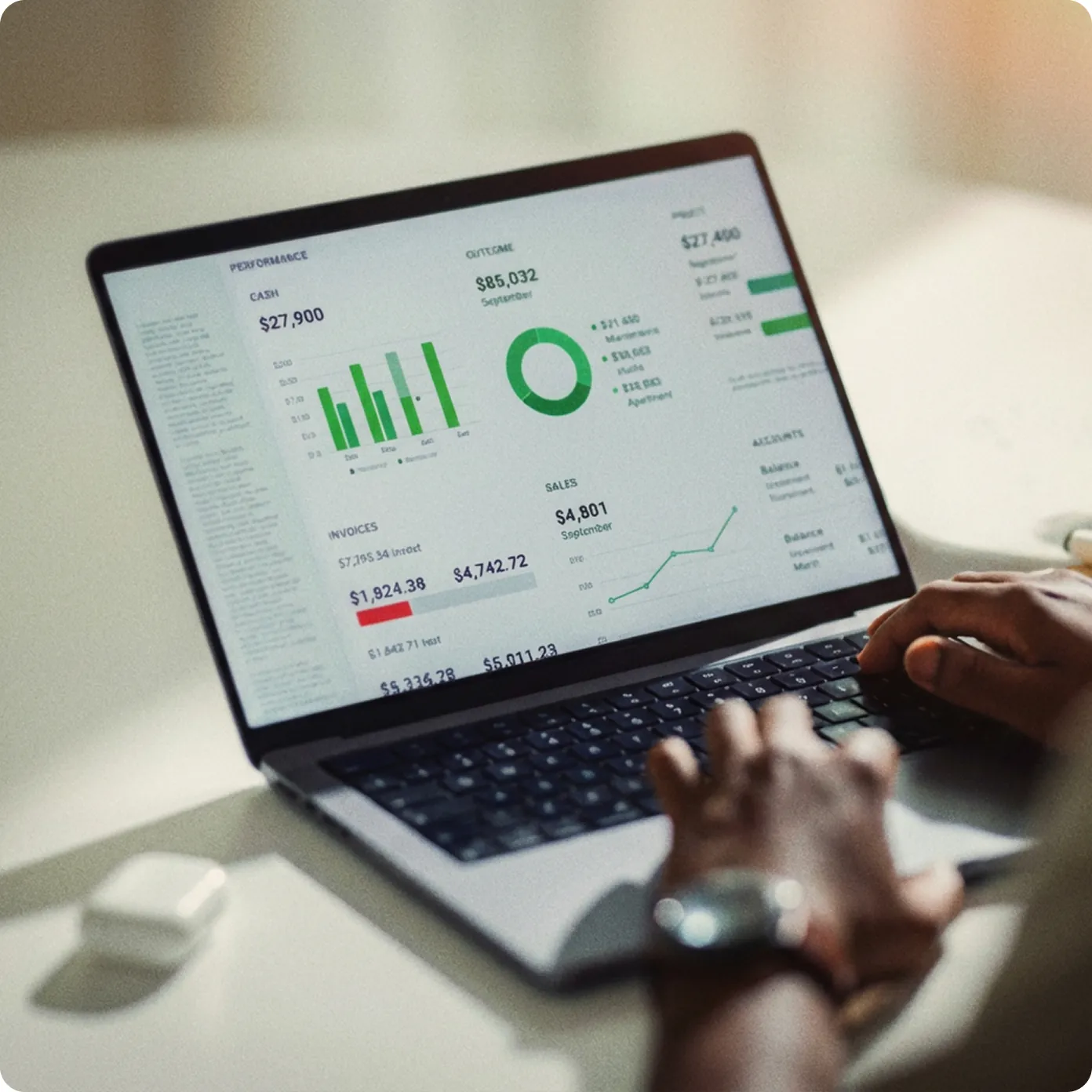 Person reviewing analytics dashboard on a laptop